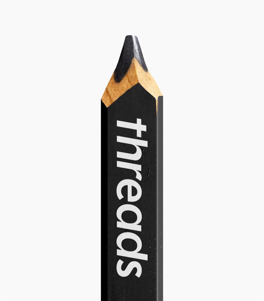 Le wordmark Threads peint sur un crayon à pointe biseautée, illustrant le concept Trending Chisel